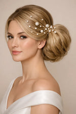Pic chignon mariage perle blanche