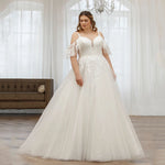 Robe de mariée Princesse grande taille