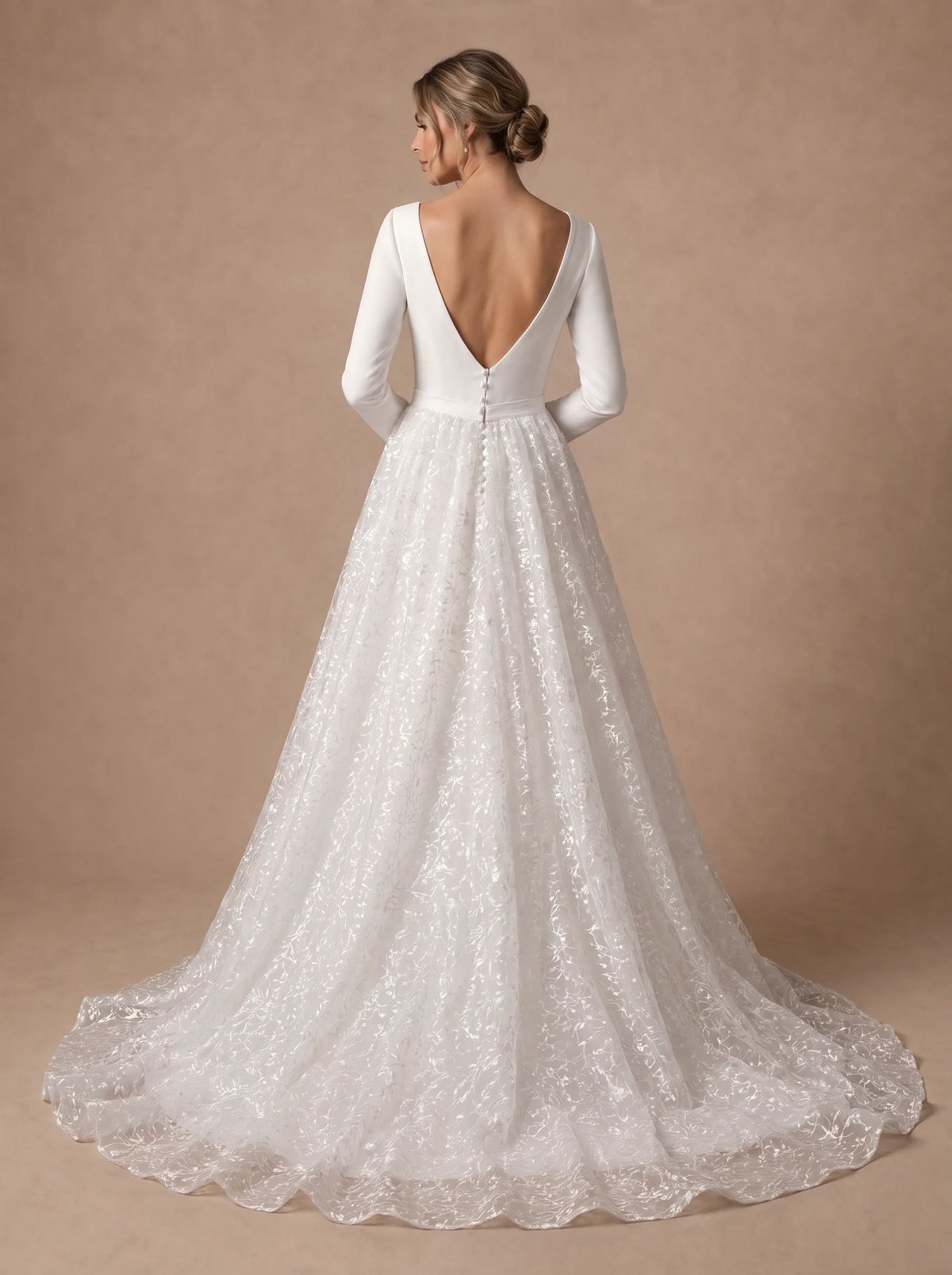 Robe de mariée trapèze manche longue