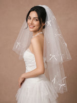 Voile de mariée blanc à petits nœuds satinés avec perles – 80 cm