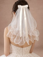 Voile de mariée blanc court à nœud en satin et perles – 55 cm