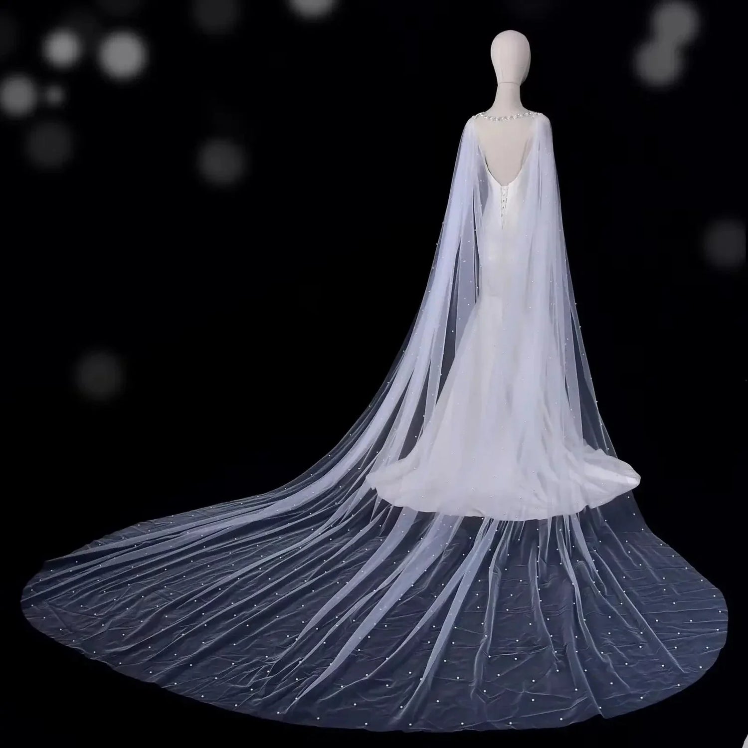 Gros plan sur les détails de Cape de Mariee Longue