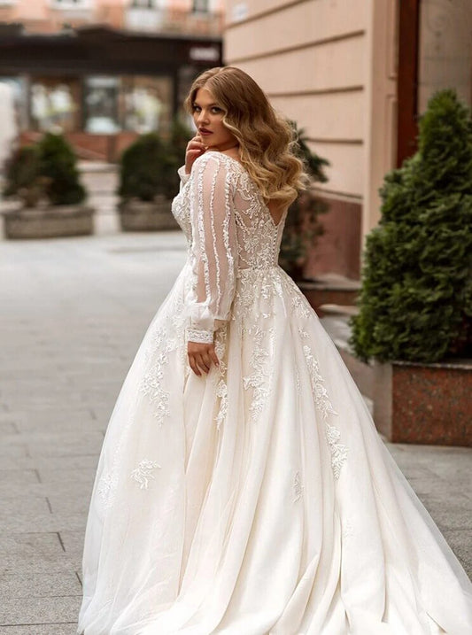 Robe de mariée grande taille avec manches